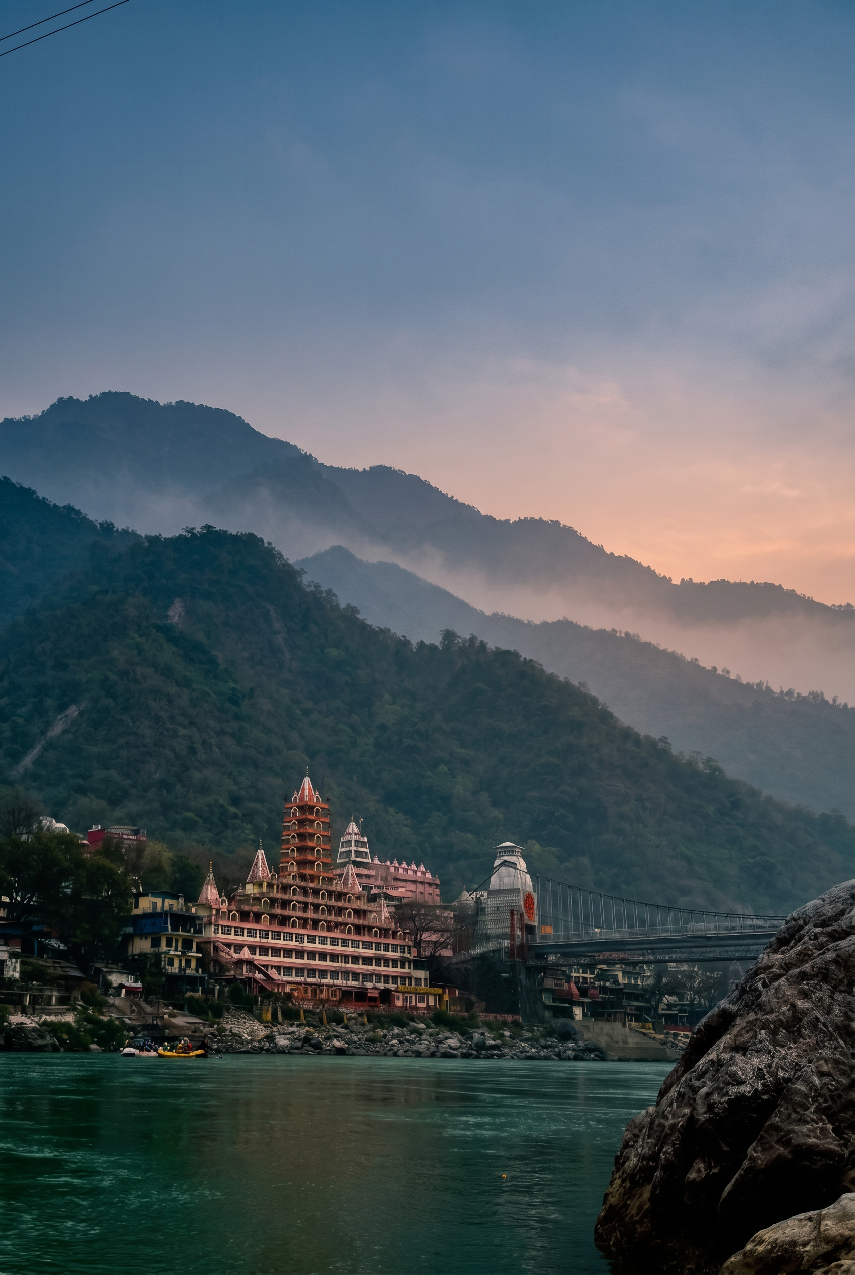Rishikesh, Ganga, temple and Lakshman Jhula at dusk